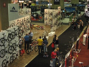 picture of trade show floor with lots of bikes